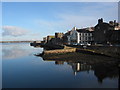 Caernarfon walled town, with Anglesey in the distance.