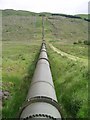 NN4636 : Glen Lochay water pipe by Graham Ellis