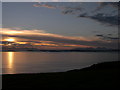 NR6842 : Sunset over Gigha, Islay and Jura from North Beachmore Restaurant by Alasdair Bennett