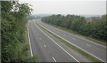SJ3363 : A55 trunk road through Broughton by Dennis Turner
