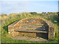 Memorial Seat beside footpath.