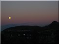 NT2673 : Moon over Salisbury Crags. by Richard Webb