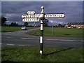 Old signpost on the A534 at Faddiley