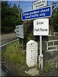 SD9527 : Traffic signs and milestone, Blackshaw Head by Phil Champion