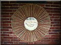 Porthole window in the lych gate