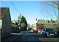 Oaksey with church on left and school beyond