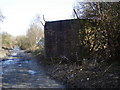 Pillbox watches over  the abandoned railway