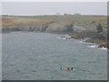 SH2379 : Canoeist leaving Porth Dafarch by Phil Williams