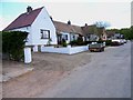 Row of bungalows near Nether Toucks