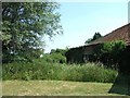 SP7229 : Farm buildings at Folly Farm by Rob Farrow