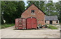 Railway trucks used as storage at Dogdean Farm, nr Homington