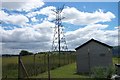 Pylon near water reservoir building