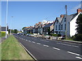 Houses along the A487 in the village of Dinas Cross