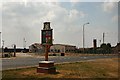 Village sign and control tower