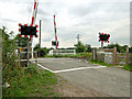 SE5416 : Railway Crossing - Walden Stubbs by John Rinder