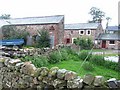 NY6727 : Old cottage and barn at Close House, Knock by Oliver Dixon