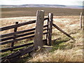 SE0780 : Boundary stone and gate at the summit of Little Haw (516m) by Bill Griffiths