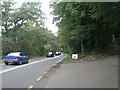 Junction of A281 and footpath leading to Furnace Lakes