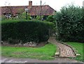 Winding garden path to Rosemary Cottage