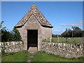 SP1315 : Cotswold stone bus shelter by Philip Halling