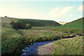 Looking upstream on the Blackwater with Upper Ardwell Farm to the left.