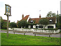 Roydon: The Church House & the village sign