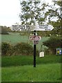 ST9515 : Signpost to Farnham Farm by Toby
