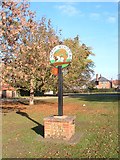TF6424 : North Wootton village sign by Martin Pearman
