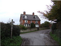 SJ8133 : Lane junction and house  in Aspley by Graham Burnett