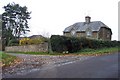 Cottages at the entrance to Slade Farm, Kingham