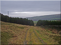SK0298 : Coming off Tintwistle Low Moor by michael ely