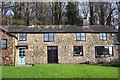 Cottage backed by Cefngarw Wood