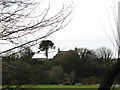 Glanrafon Farmhouse viewed from across the Seiont