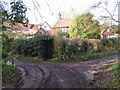 Houses at junction of  lane to ford at Hanging Wood