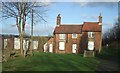 Leaning farmhouse on the Wren