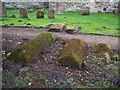 Lichen covered tombs in St Michaels Churchyard