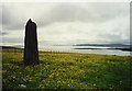 HP6000 : Clivocast standing stone with Fetlar on the horizon by Tom Pennington