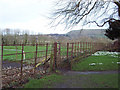 Kissing gate leading from churchyard of the Church of the Holy Rood