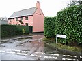 Salmon pink house on Denton Lane, Wootton