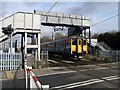 At Cheshunt Station crossing, Herts - Train approaching