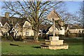 Village sign and estate houses at Laxton