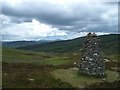 NN8569 : The Lady March Cairn by Roger Boston