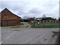 TM1491 : Farm Buildings, Low Common by Ian Robertson