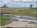 Junction of roads and farm track