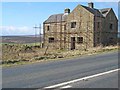 House under reconstruction beside the A68