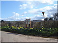 Road junction and village sign, Wernrheolydd