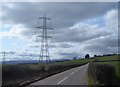 SO3714 : Pylon by the B4233 looking towards Llanvapley by Ruth Sharville