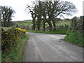 Moorcroft Road (right) joins Ballycoan Road.