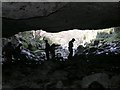 Cavers in Porth-yr-Ogof cave