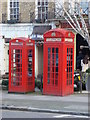 TQ2783 : Big and small red phonebox by Oxyman